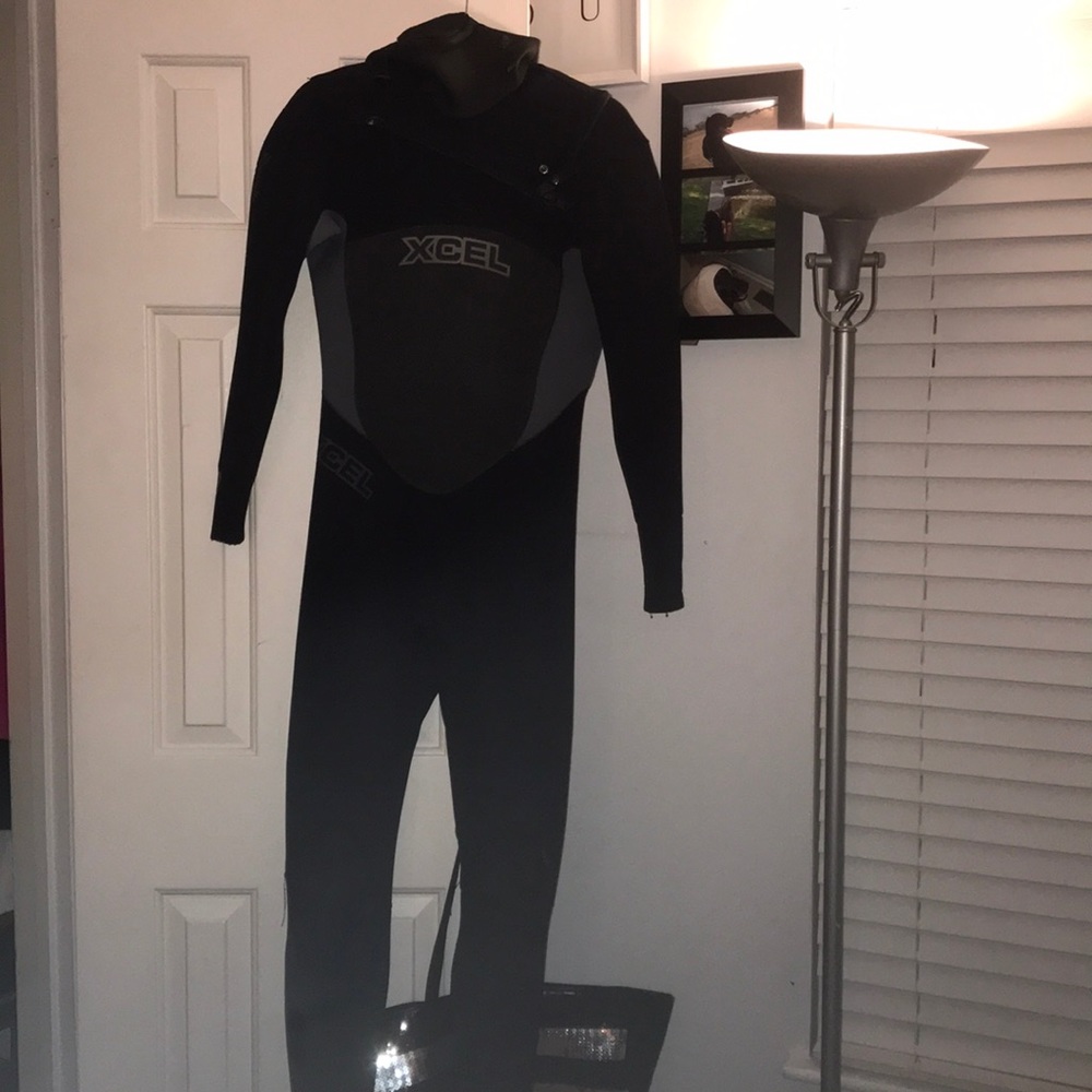 Black xcel wetsuit with a hood